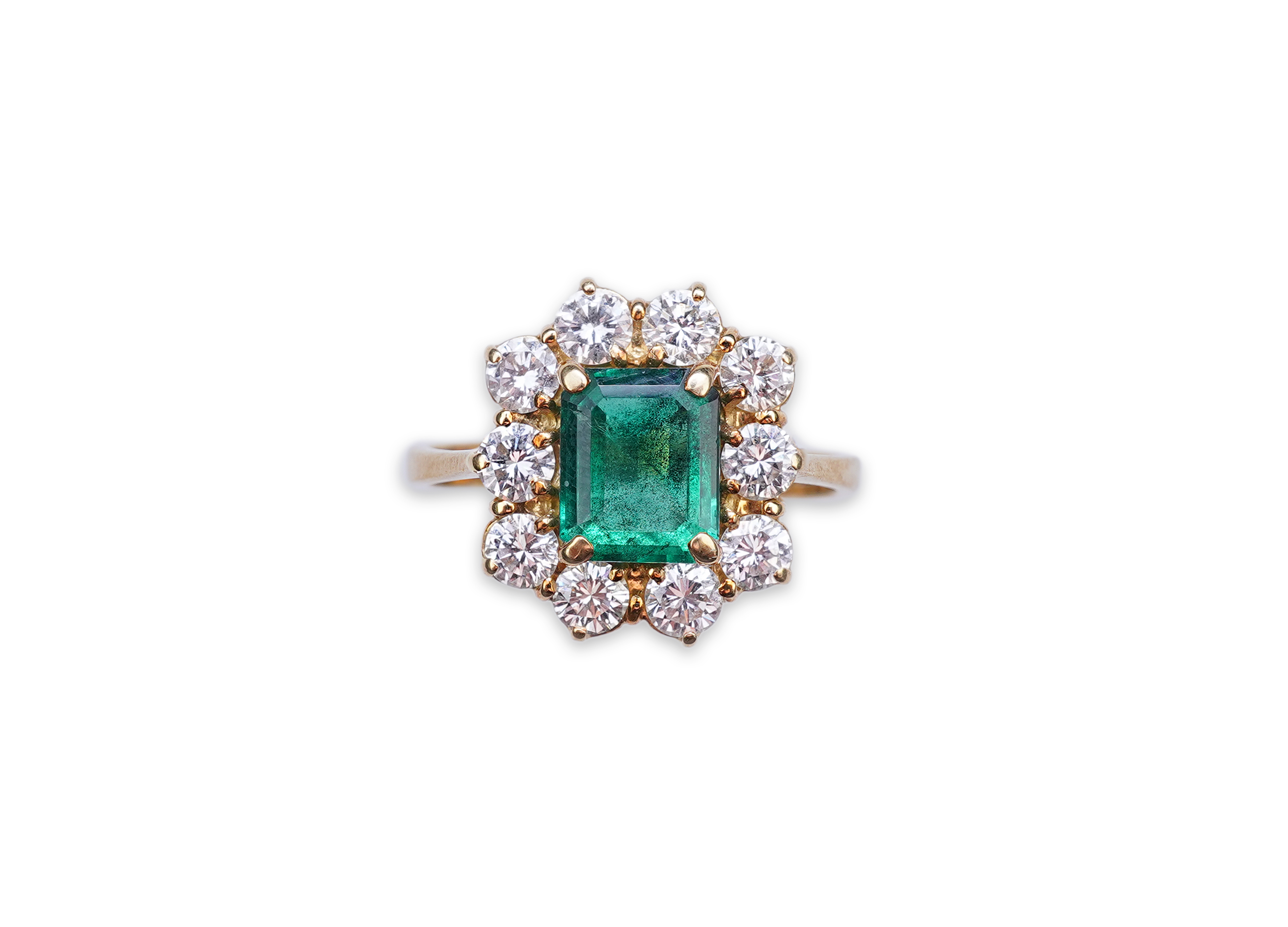 A synthetic emerald and diamond ring